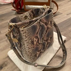 Slightly used Brahmin mermaid core bag. Comes with sleeper bag and ID card.